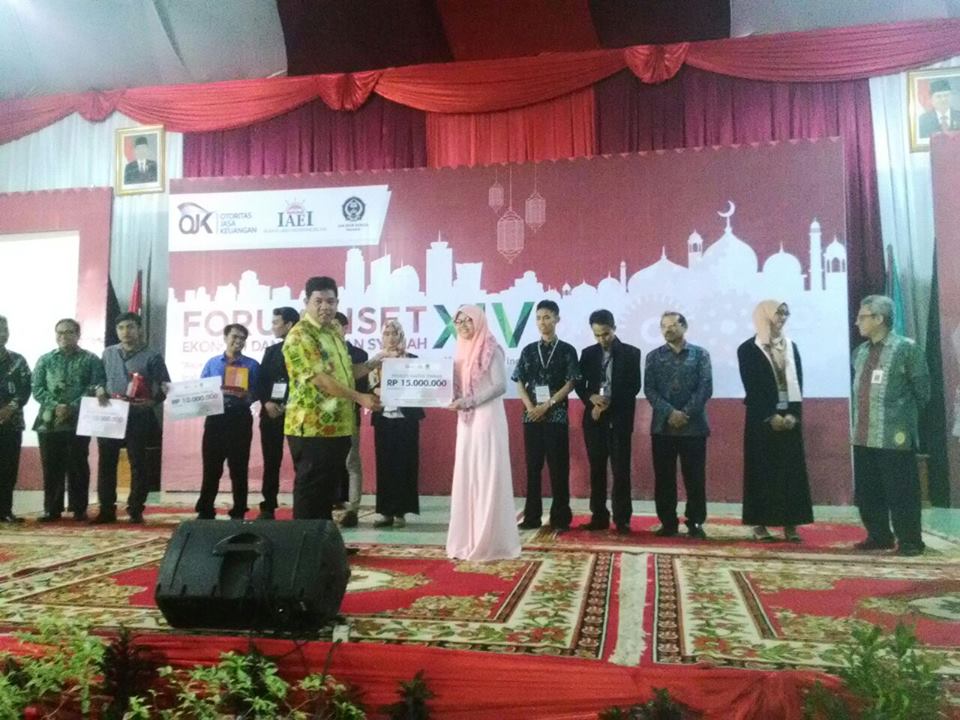 Abrista Devi Raih Prestasi Juara I Peneliti Madya - Photo: pagesuika